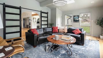 Smart TV, fireplace, books, offices