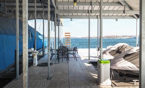 Outdoor dining - Honeysuckle House-Luxury 5BR&Loft Lakefront-King Suites-Chef Kitchen-Custom Dock (Gravois Mills)