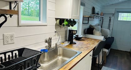 1-bedroom cabin located at The Market & Drinkery. 11 miles North from NRG bridge