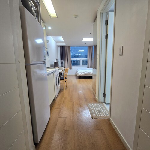 Stay at We've House in Gangnam. The accommodation is 5 minutes from COEX.