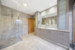 Shower, towels, soap, toilet paper