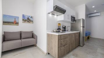 Fridge, microwave, stovetop, coffee/tea maker
