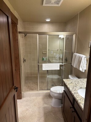 Jetted bath, hair dryer, towels, soap