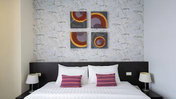Family Suite, 2 Bedrooms | Minibar, in-room safe, laptop workspace, blackout curtains