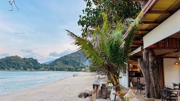 On the beach, white sand