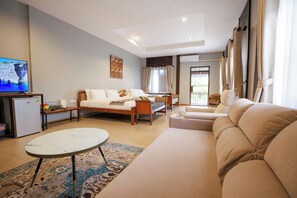 Deluxe Room, Balcony, Pool View | Living area - Cozy Lanna Hotel (Chiang Mai)