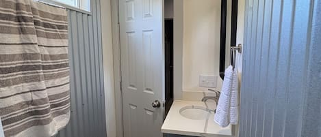 Shower, towels, toilet paper