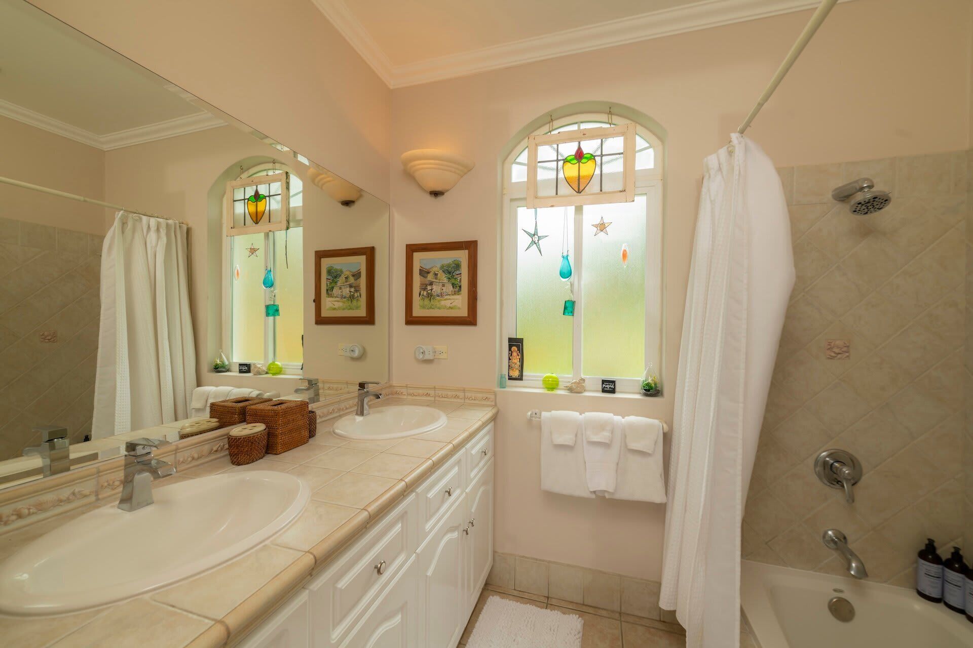 Shower, hair dryer, towels, shampoo