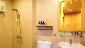 A bathroom with a toilet, sink, shower, and a shelf with toiletries. - The Golden Glow - Private Self-Check Studio In Center District 10 (Thành phố Hồ Chí Minh)