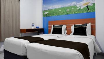 A double bed with white and brown bedding, a nightstand with a water bottle, and a wall mural of a field with daisies.