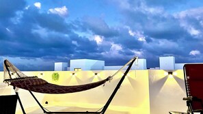 Terrace/patio - Rooftop Bliss Cozy 2-bedroom condo in soothing Punta Cana with private rooftop (Punta Cana)