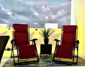 Terrace/patio - Rooftop Bliss Cozy 2-bedroom condo in soothing Punta Cana with private rooftop (Punta Cana)