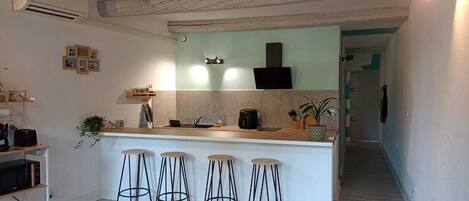 Fridge, microwave, stovetop, coffee/tea maker