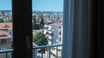 Deluxe Triple Room, Balcony, City View | City view