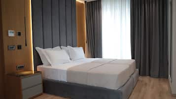 Frette Italian sheets, premium bedding, down duvets, memory-foam beds