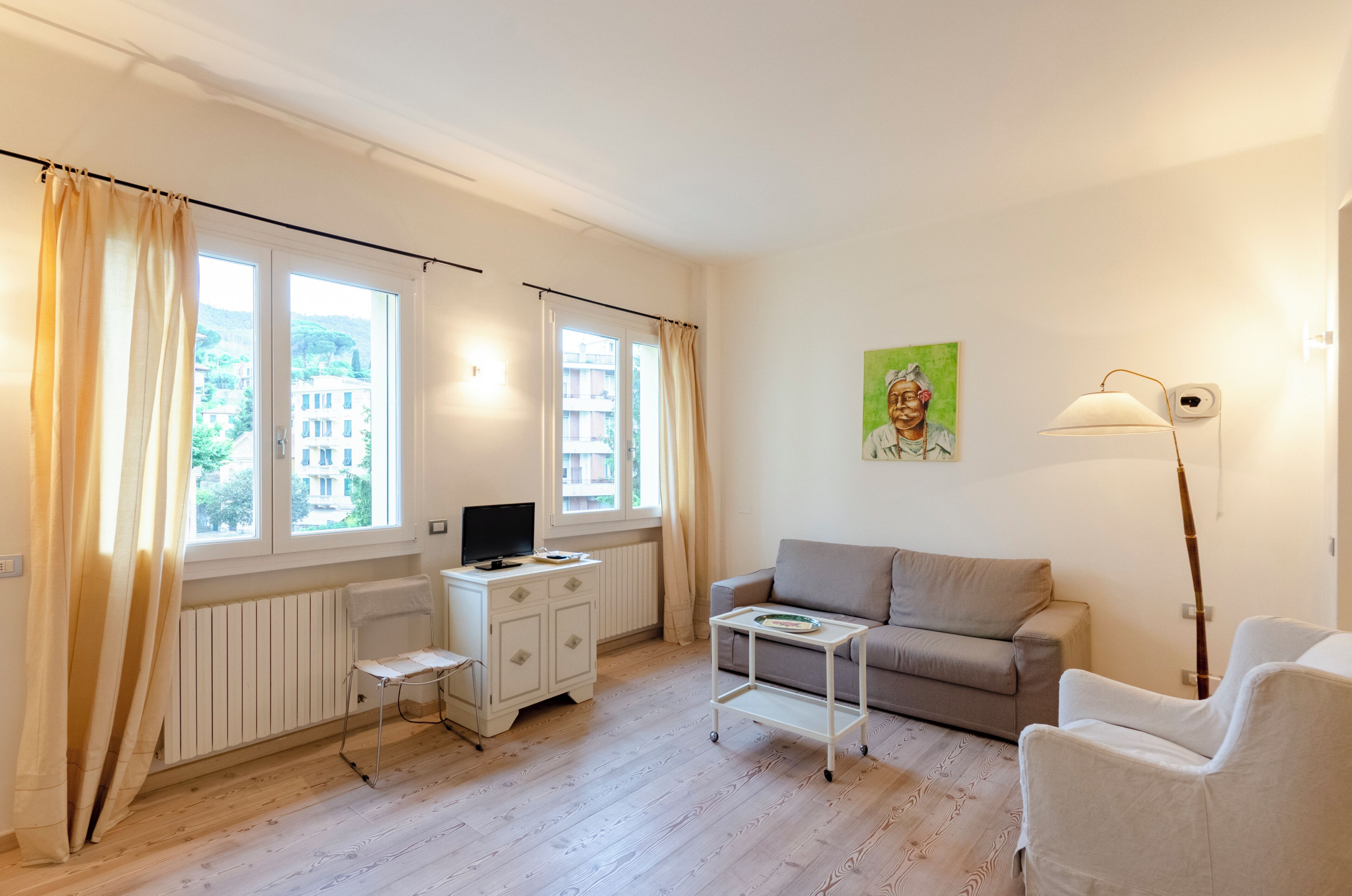 Family Apartment, 6 Bedrooms, Balcony, Mountain View | Living area | 32-inch flat-screen TV with cable channels