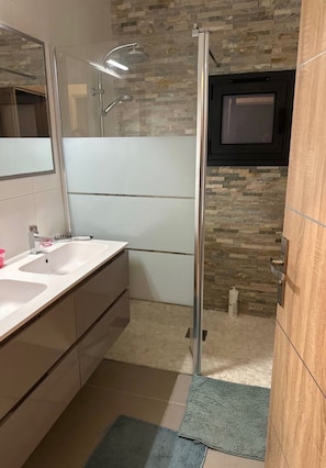 Shower, hair dryer, towels, soap