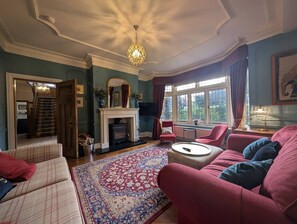 TV, fireplace - Allenbrook Holiday Rental (Colwyn Bay)