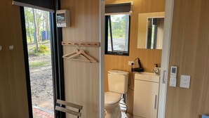 Shower, hair dryer, towels, shampoo - Wych Wood Bush Hideaway 1 by Tiny Away (Wyongah)
