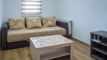 Basic Quadruple Room | Living area