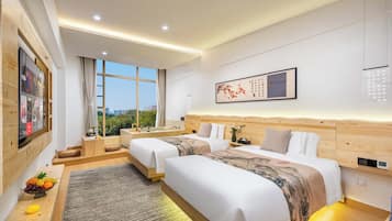 Habitación superior con 2 camas individuales, vista a la ciudad