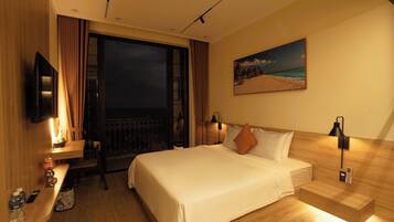 Deluxe Room, Ocean View | Blackout drapes, iron/ironing board, free WiFi