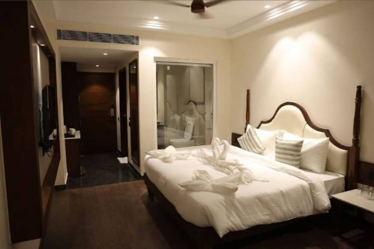 Habitación Deluxe con 1 cama matrimonial o 2 individuales, vista a la ciudad