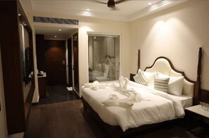 Habitación Deluxe con 1 cama matrimonial o 2 individuales, vista a la ciudad