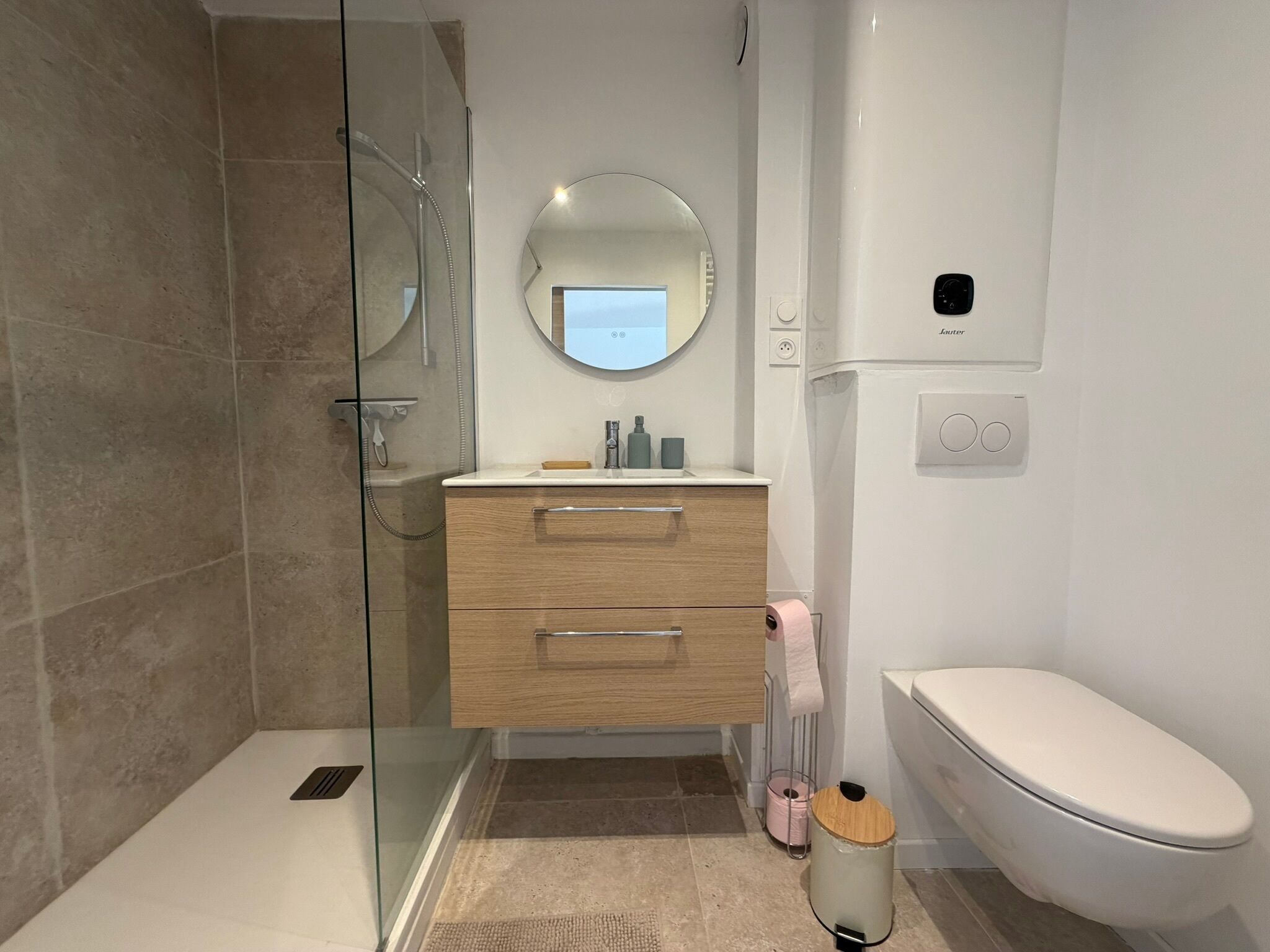 Shower, hair dryer, towels, toilet paper