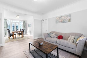 Family House, Patio | Living area | 42-inch Smart TV with digital channels, Netflix, streaming services - Spacious 5 Bedroom Family Home in Harrow (Harrow)