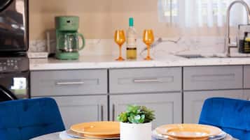 Coffee/tea maker, fridge, microwave, oven