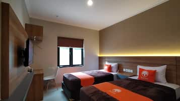 Habitación ejecutiva con 2 camas individuales | Ropa de cama de alta calidad y escritorio