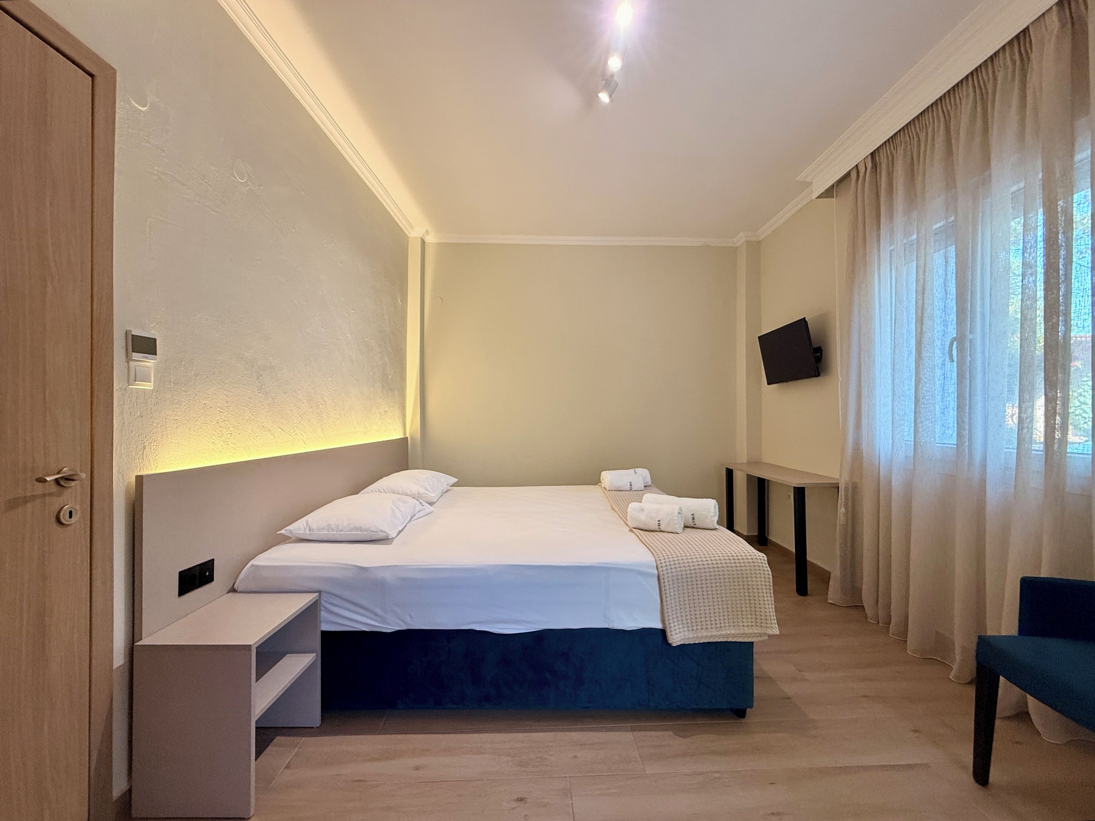 Apartament familiar, vistes al pati | Escriptori, espai de treball apte per a portàtils i wifi gratuïta 
