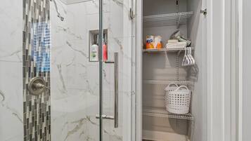 Shower, hair dryer, towels