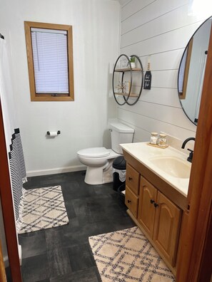 Hair dryer, towels, soap, toilet paper