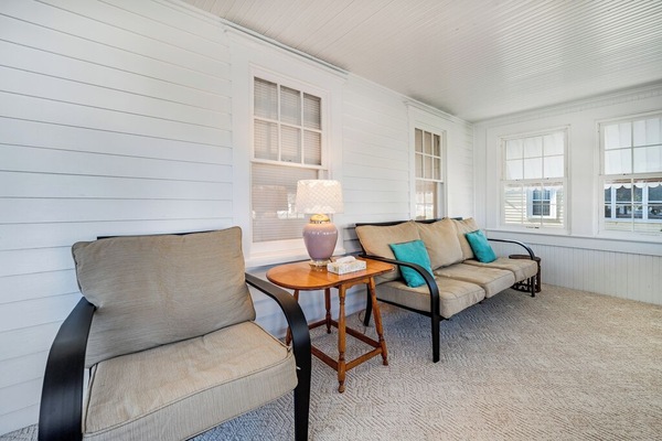 A cozy Front Porch lines the front of the house!