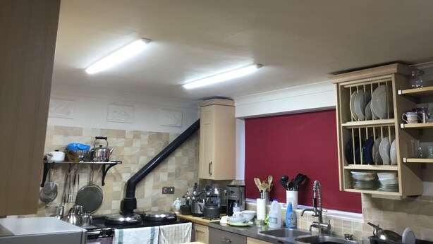 A kitchen with a stove, sink, and various utensils. - Wansley Manor (Birmingham)