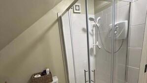 A small, modern bathroom with a glass shower enclosure, a toilet, and a bidet. - Private Ensuite Room Near Town With Quiet Garden (Letterkenny)