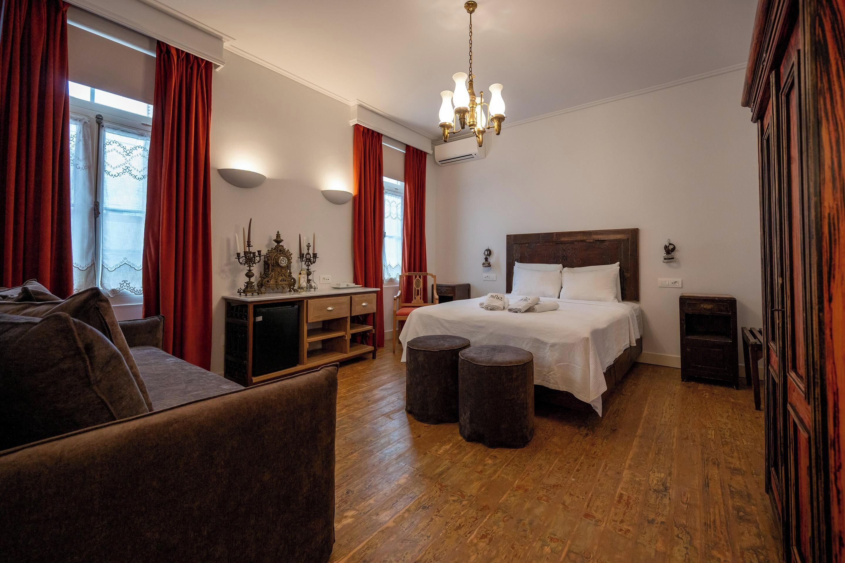 King Suite with Village View | Egyptian cotton sheets, premium bedding, pillow-top beds, in-room safe