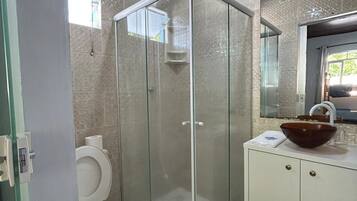 Shower, towels, soap, toilet paper