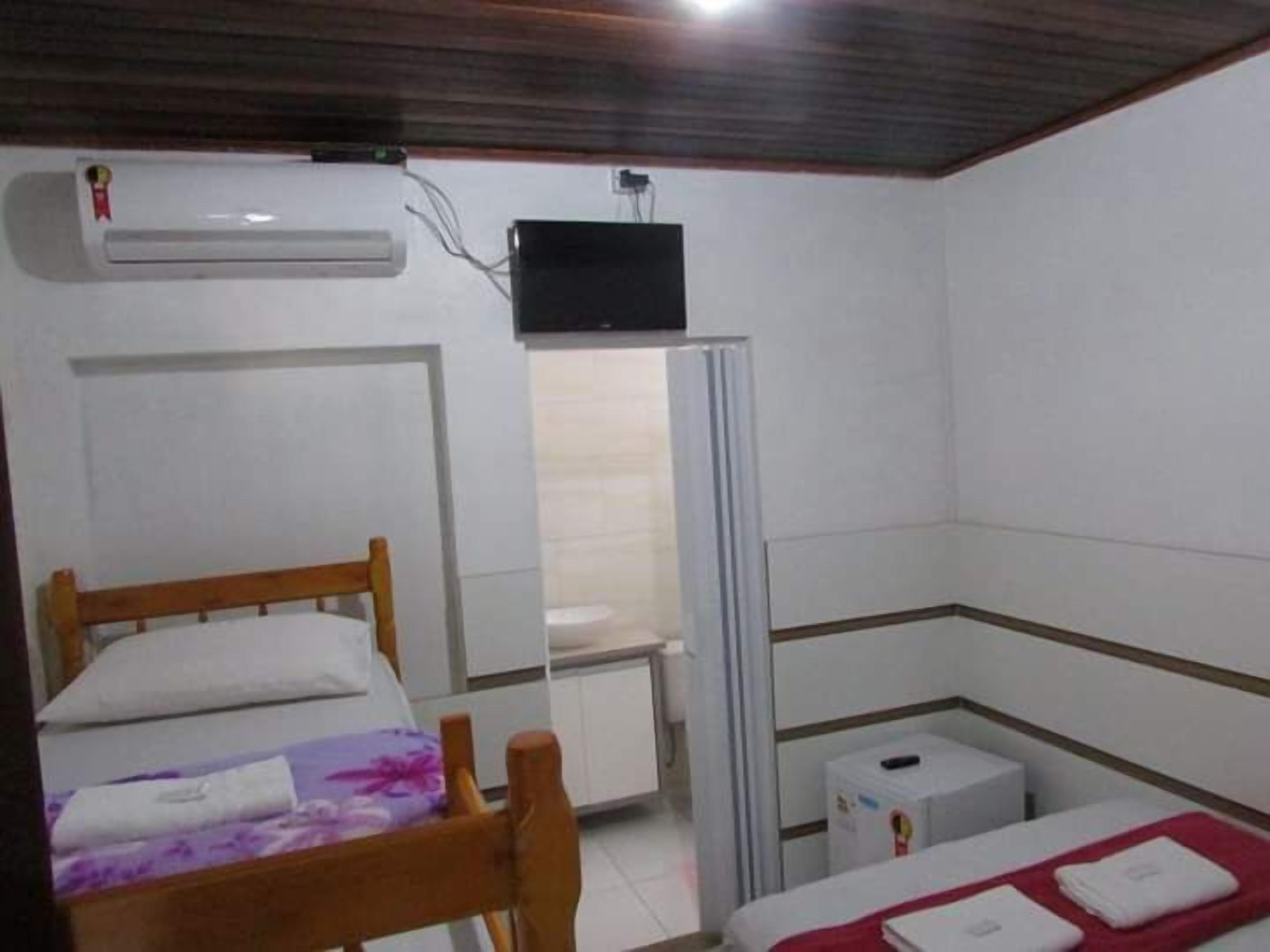 Family Triple Room | Minibar, iron/ironing board, free WiFi