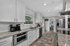 Fridge, microwave, oven, stovetop - 4 bedrooms 2 1/2 baths with pool that can be heated. (Saint Simons Island)