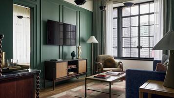 Gladys Suite | Living area | 55-inch Smart TV with cable channels