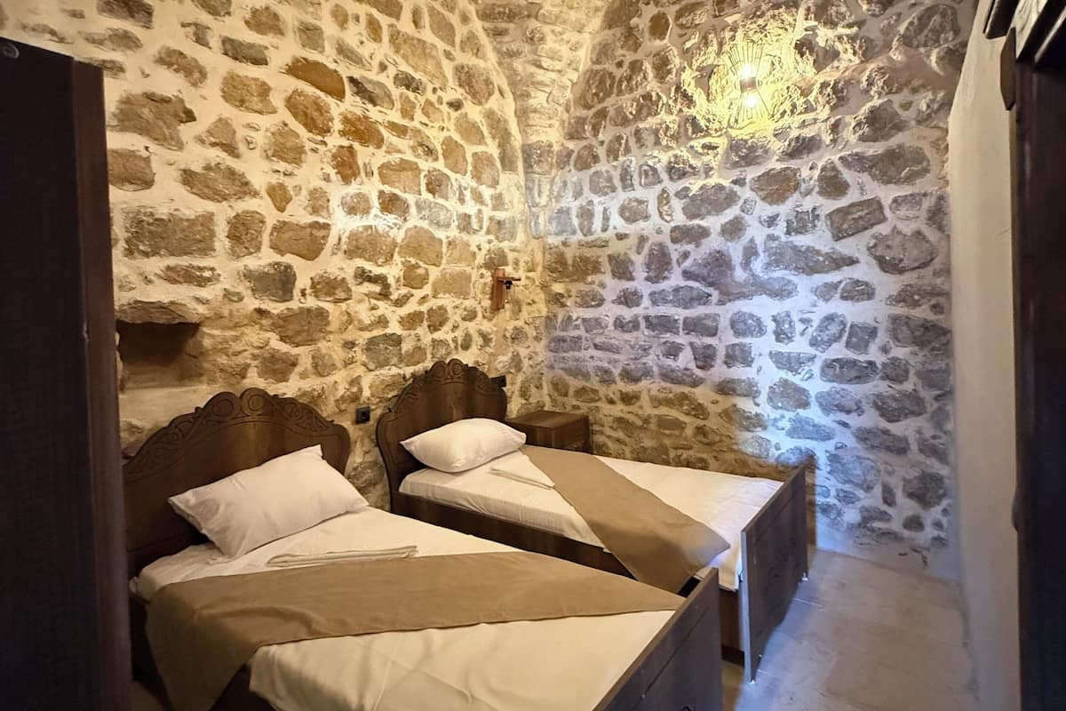 Habitación Deluxe con 1 cama matrimonial o 2 individuales, vista al patio