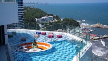 Outdoor pool, open 2:00 PM to 10:00 PM, sun loungers