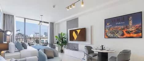 Studio Luxe, balcon, vue ville | Salle de séjour