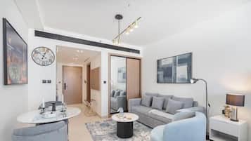 Estudi de luxe, balcó, vistes a la ciutat | Sala d'estar