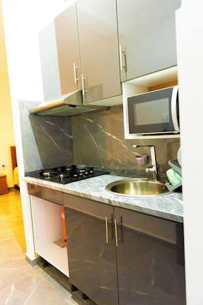 Monolocale Deluxe, angolo cottura | Cucina privata