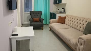 Leilighet, balkong, byutsikt | Oppholdsområde