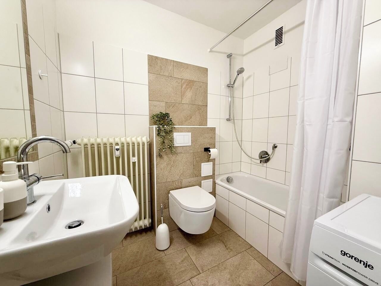 Hair dryer, towels, soap, toilet paper